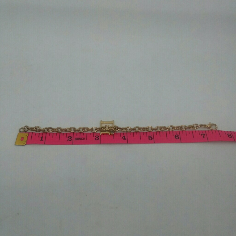 Diamonds International Gold-Tone Charm Bracelet - Picture 4 of 4